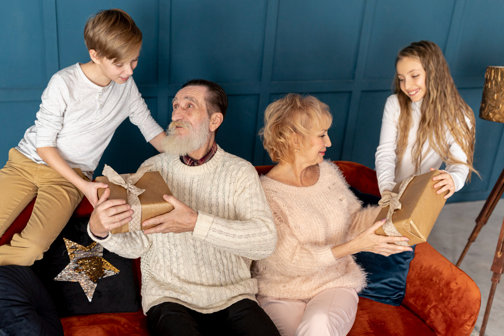 front-view-grandchildren-giving-their-grandparents-gifts.jpg