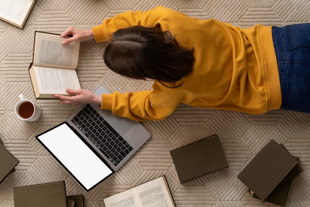 medium-shot-woman-with-books.jpg