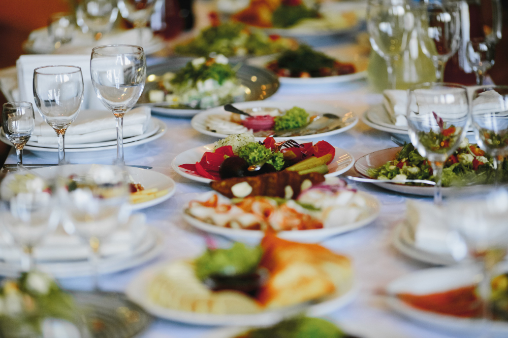 plates-with-variety-food-on-the-celebration-table.jpg