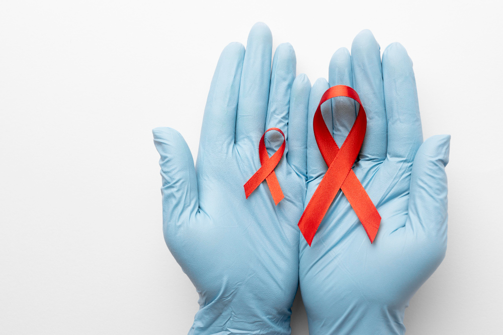 person-holding-an-world-aids-day-ribbon.jpg